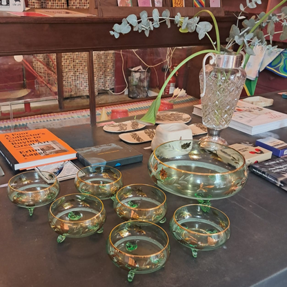 VINTAGE SET OF 7 GREEN GLASS BOWLS WITH GOLD DETAIL