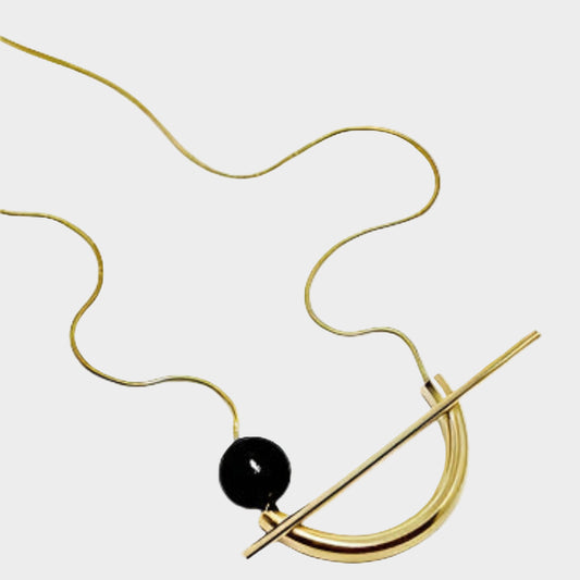 GOLD NECKLACE WITH BLACK BEAD