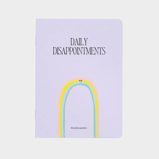 Notebook with a rainbow design and text on a white background