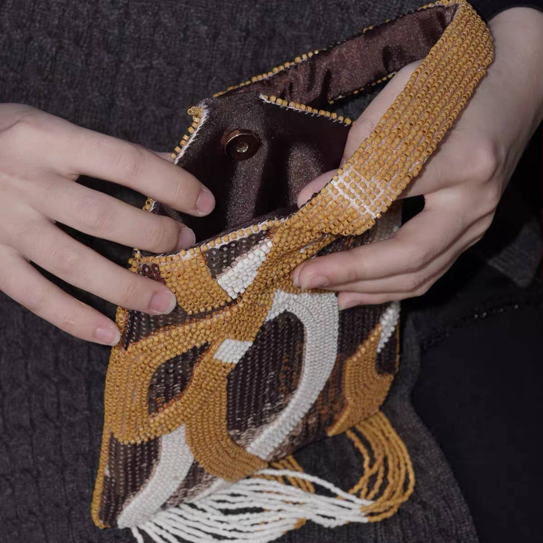 HANDMADE BEADED WHITE AND BRASS BAG