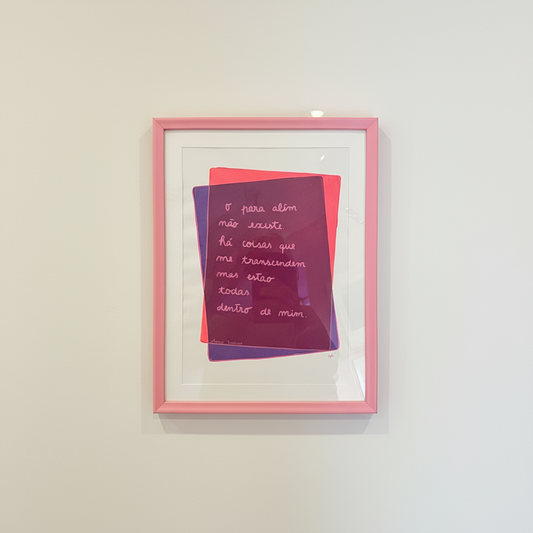 Framed artwork with pink border and text on a white background