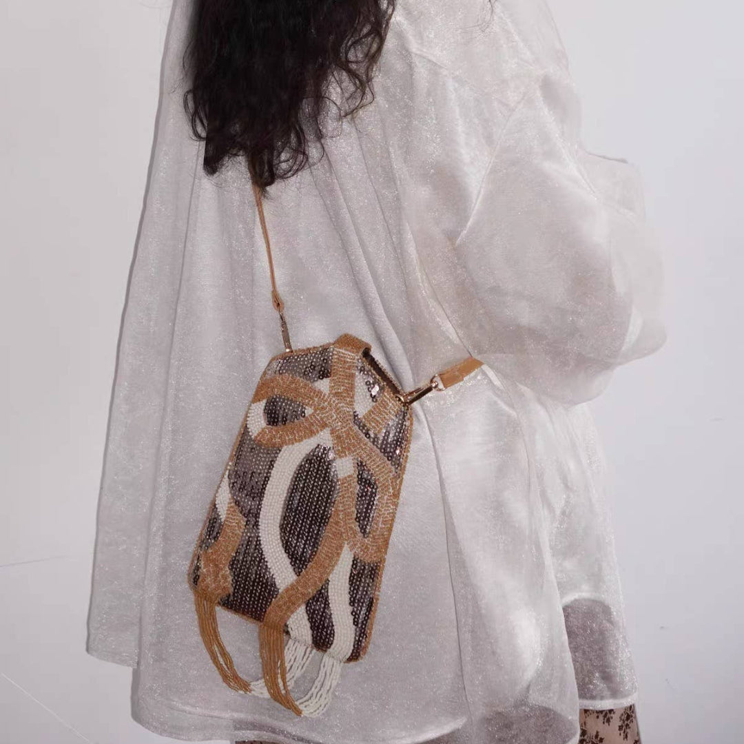 HANDMADE BEADED WHITE AND BRASS BAG