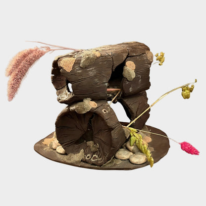 Decorative stone sculpture with plants on a red background