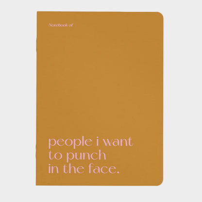 Mustard yellow notebook with text on a white background