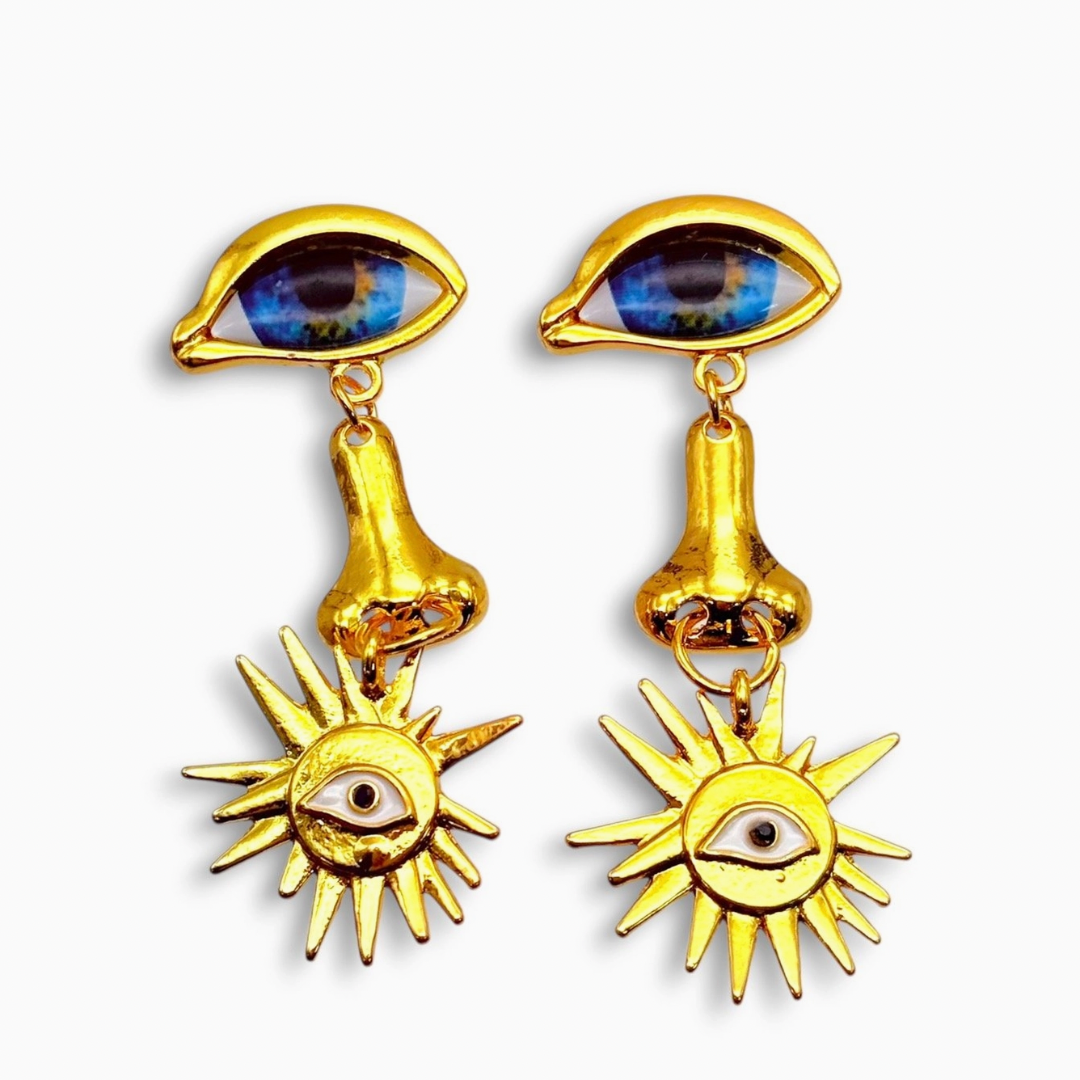 BLUE EYES AND PIERCED NOSE EARRINGS