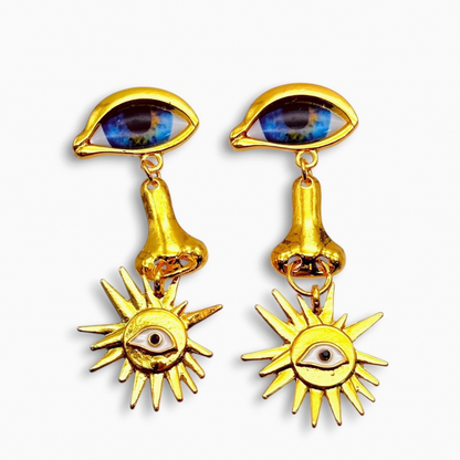 BLUE EYES AND PIERCED NOSE EARRINGS