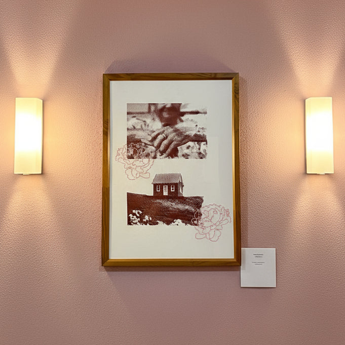 Framed artwork with a house illustration and floral elements on a textured background.